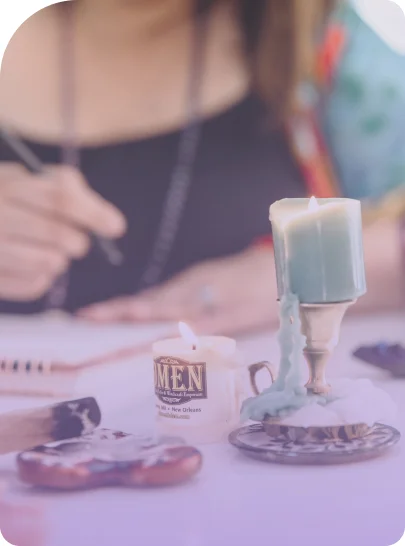 A zoom picture of candles lit on the table